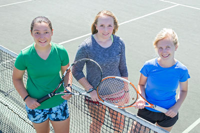 Student athletes in all of Como’s fall sports held voluntary workouts this summer. Cougar tennis captains Emma Hartmann, Mira Kammueller and Lizzy Larson frequently trained at Como and with St. Paul Urban Tennis. Photo by Mike Krivit, www.krivit.com