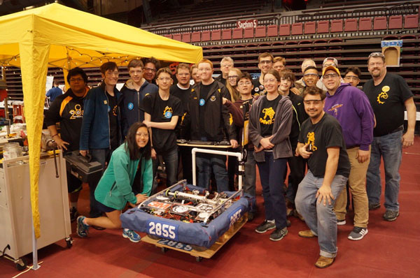 Members of the Como Robotics team and their robot “Sparky” at the 10,000 Lakes Regional Competition April 9. You can find out what happened at the state tournament at www.beastbot2855.com.