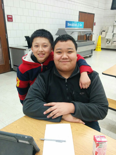 Como junior Ethimon Lee was named High School Big Brother of the Year in the Greater Twin Cities. Ethimon is pictured with his “little brother” from Como Elementary.