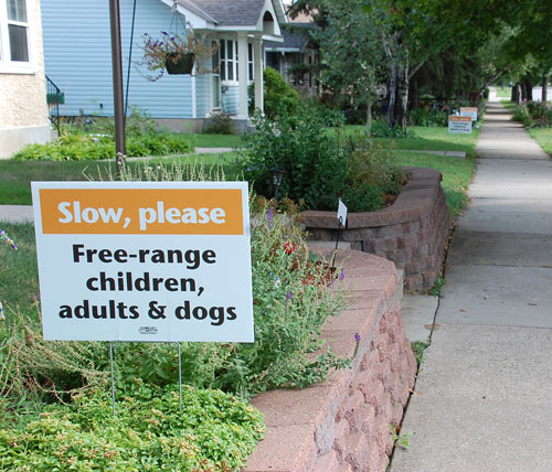 Residents on more than 60 blocks have posted lawn signs designed to make District 10 safer.